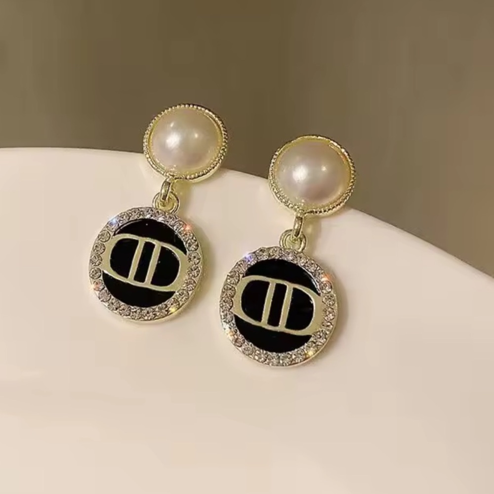 Dior Gold-Tone Pearl Stud Earrings with Black Enamel Medallions